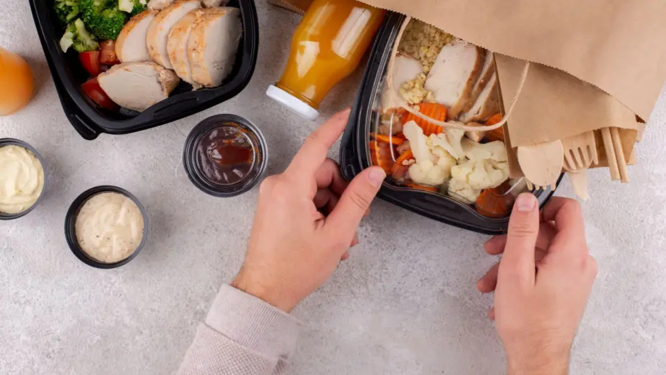 The first image provides a top-down, close-up view of someone handling the food containers.
