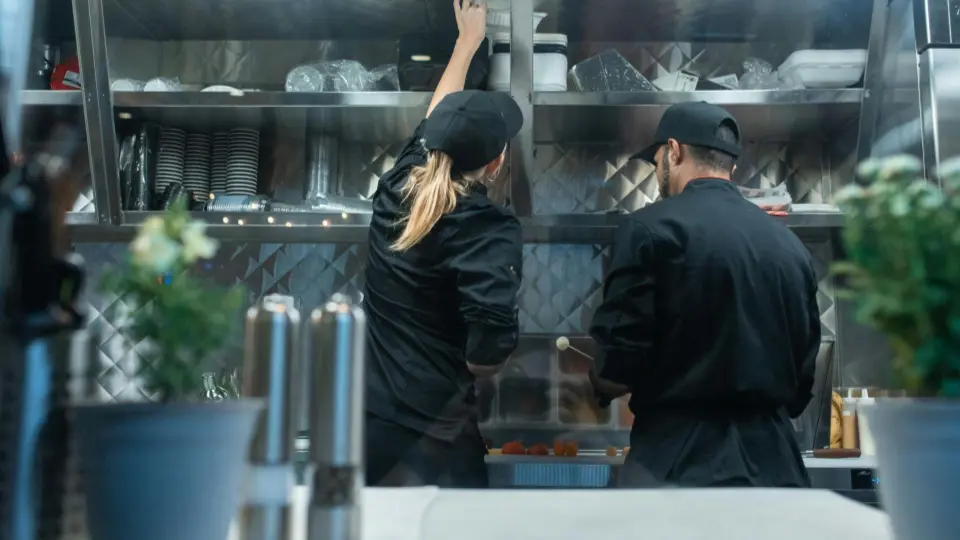 This shot highlights the fast-paced, functional nature of a commercial kitchen.