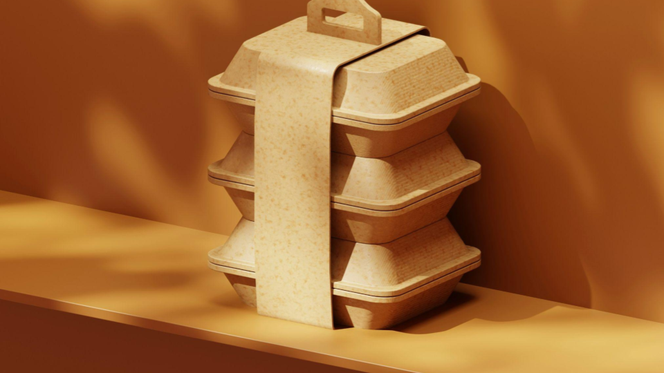 This is a high-end product shot or realistic rendering of a sustainable food packaging concept.