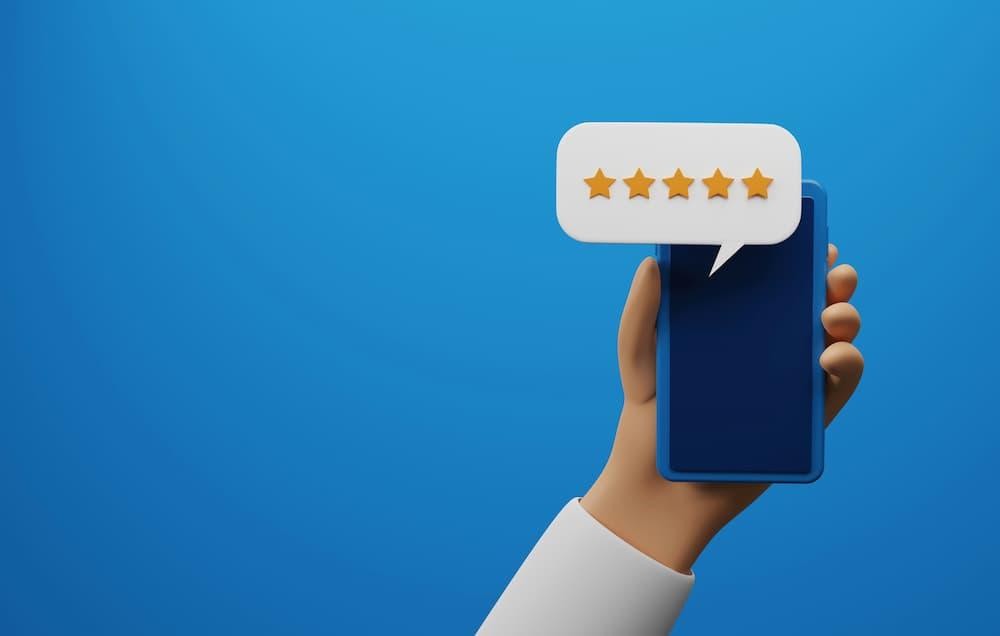 Smartphone displaying five stars of rating, symbolizing the importance of positive feedback and reviews for restaurants