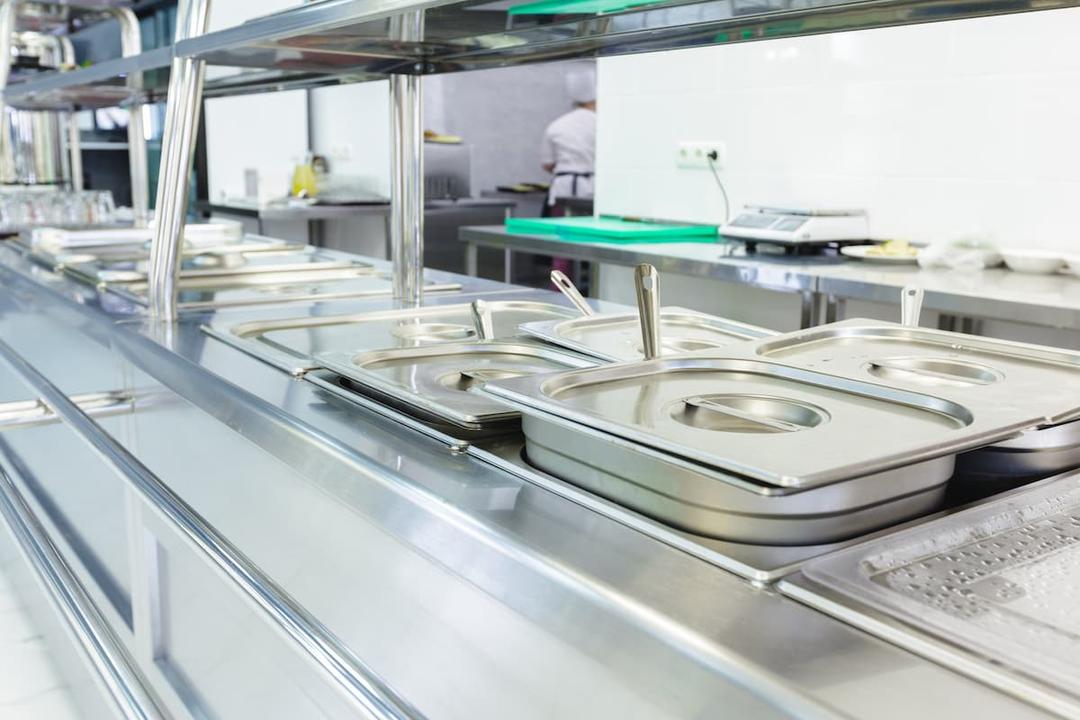 Clean commercial kitchen setup, ideal for exploring what is the best kitchen for small batch food production.